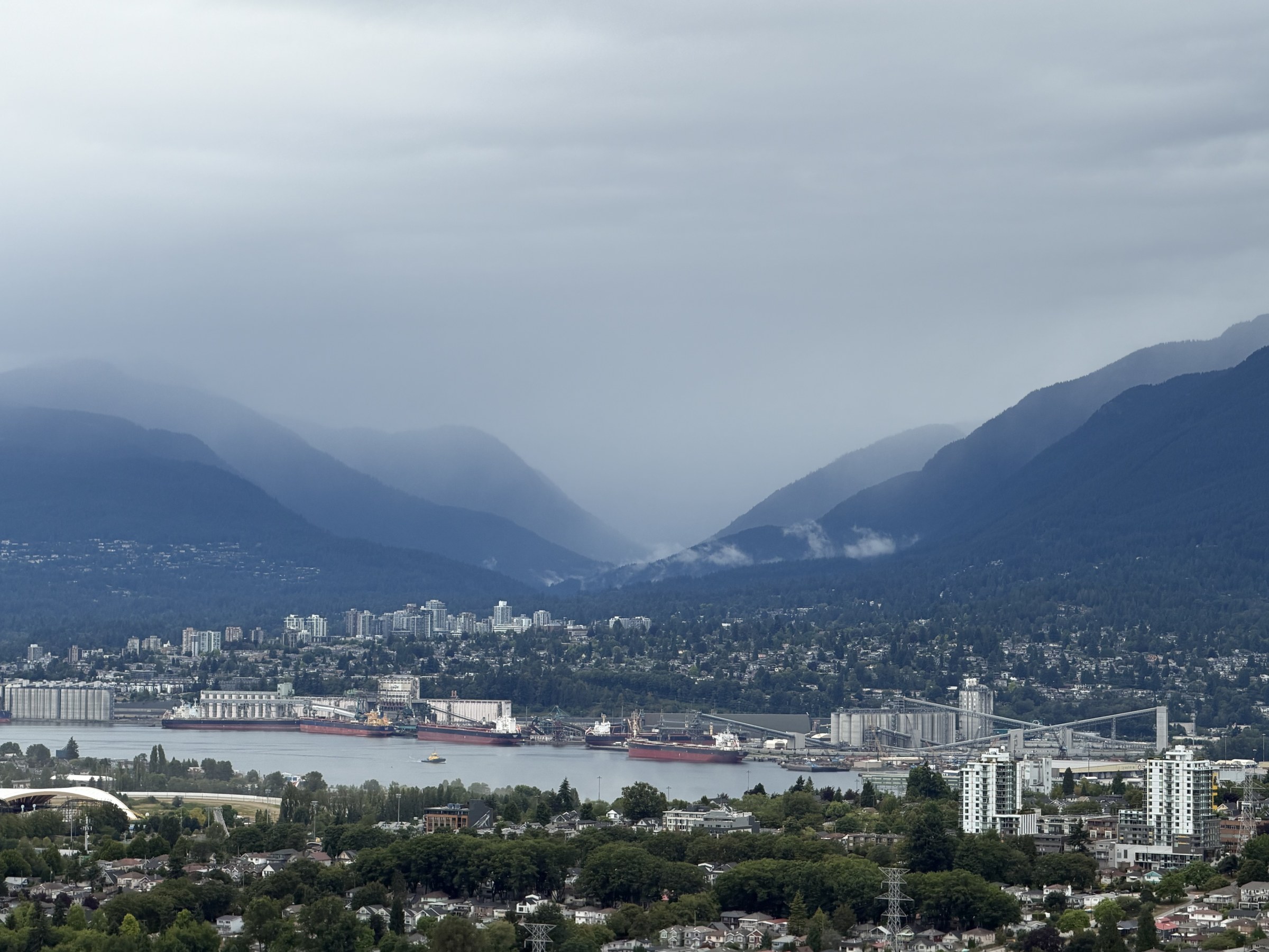Coastal mountains and harbour, photographed by David Vandermay